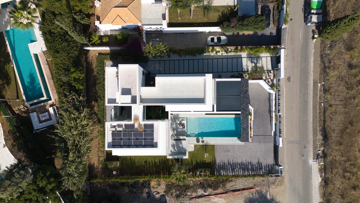 Overhead view of the new-build villa, pool and plot boundary