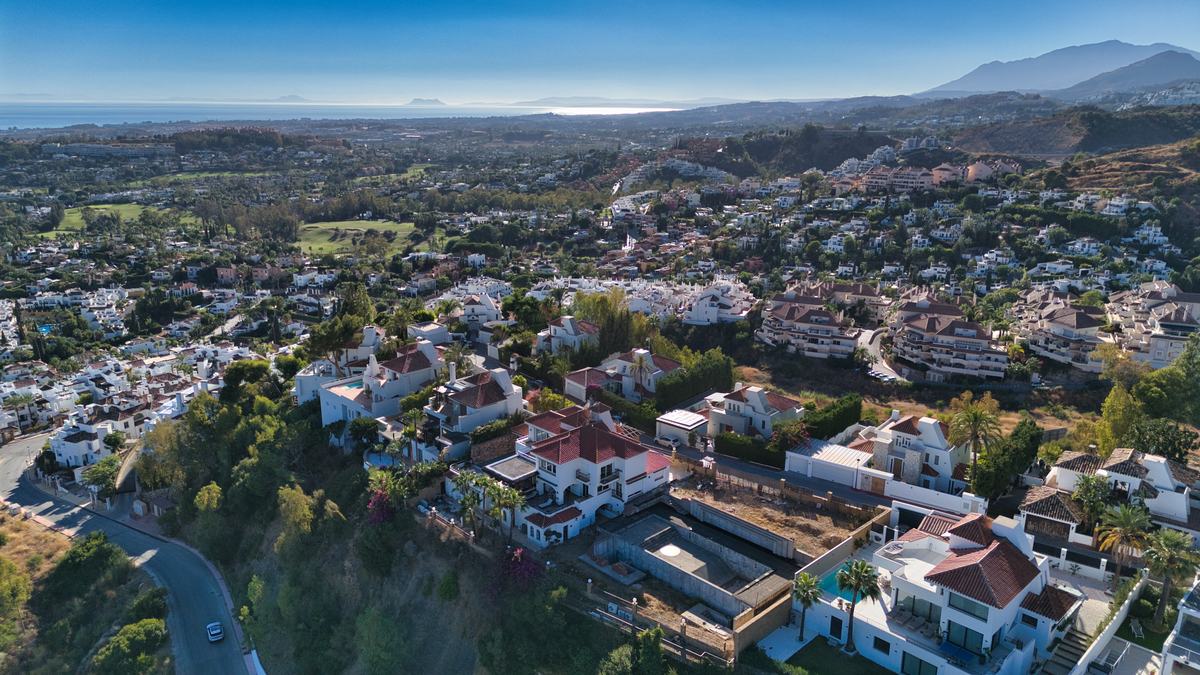 Wide aerial across the valley towards the coast