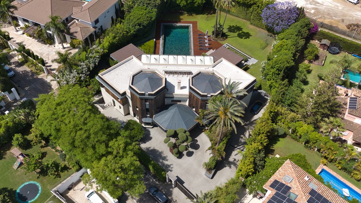 Overhead view of the same villa, roofline and driveway