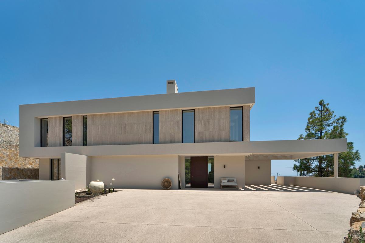 Front elevation and entrance courtyard of a contemporary villa